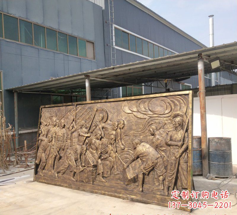 搬运工人物铜浮雕