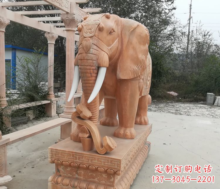 鼻卷如意的大象晚霞红门口镇宅石雕
