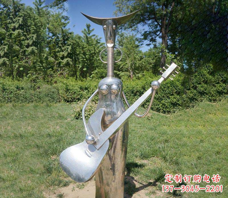 不锈钢镜面弹琴人物雕塑