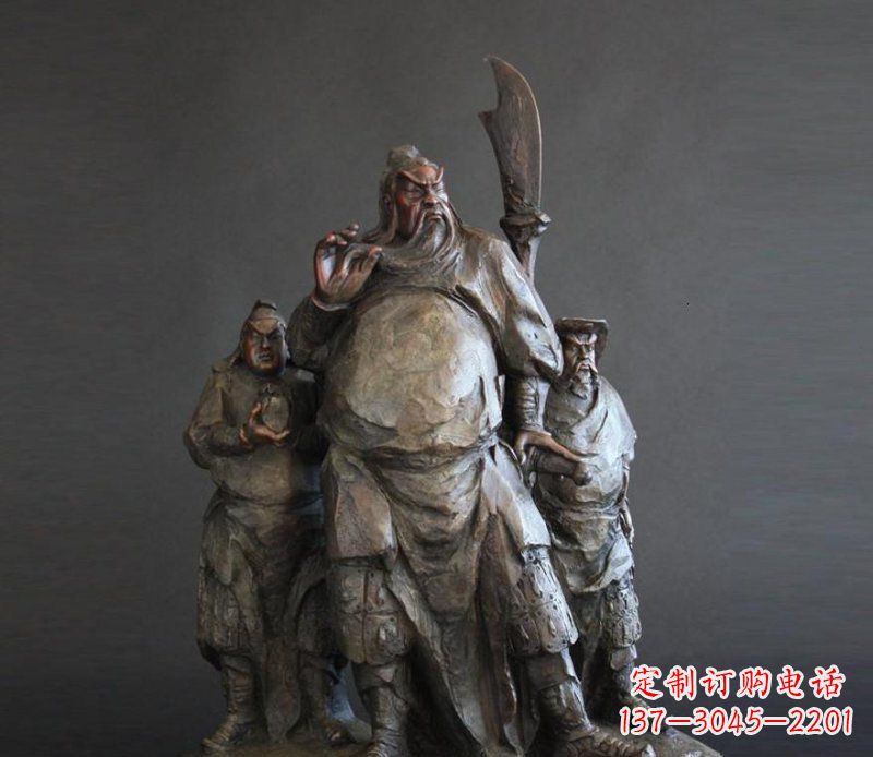 青铜雕刻的持刀关公 青铜雕刻的持刀关公
