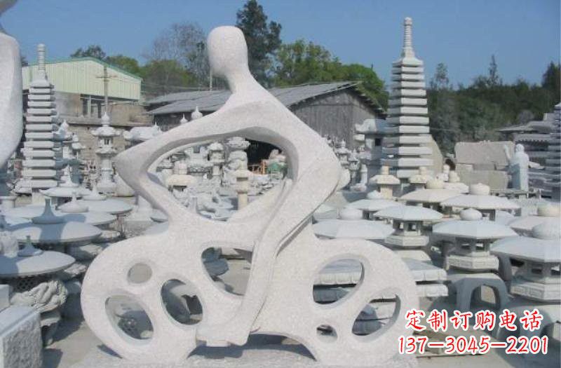 抽象骑摩托车人物石雕