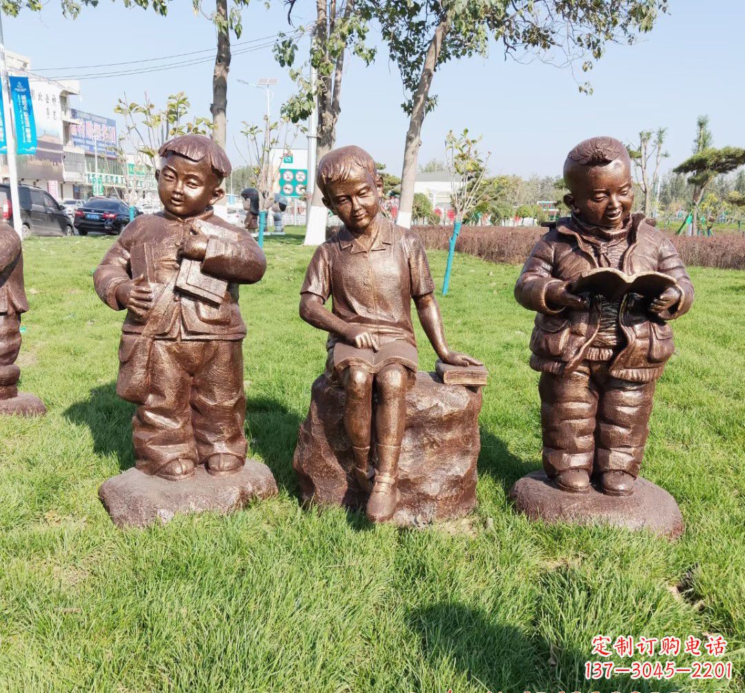 儿童看书人物铜雕