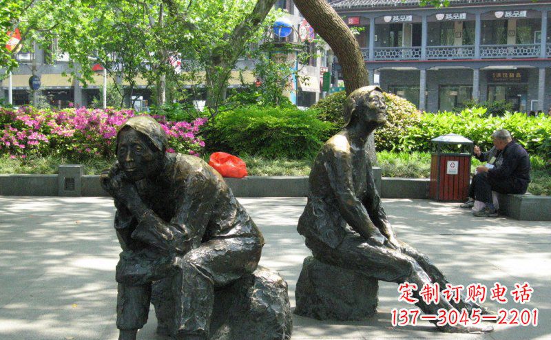 公园坐着石头的老人人物铜雕