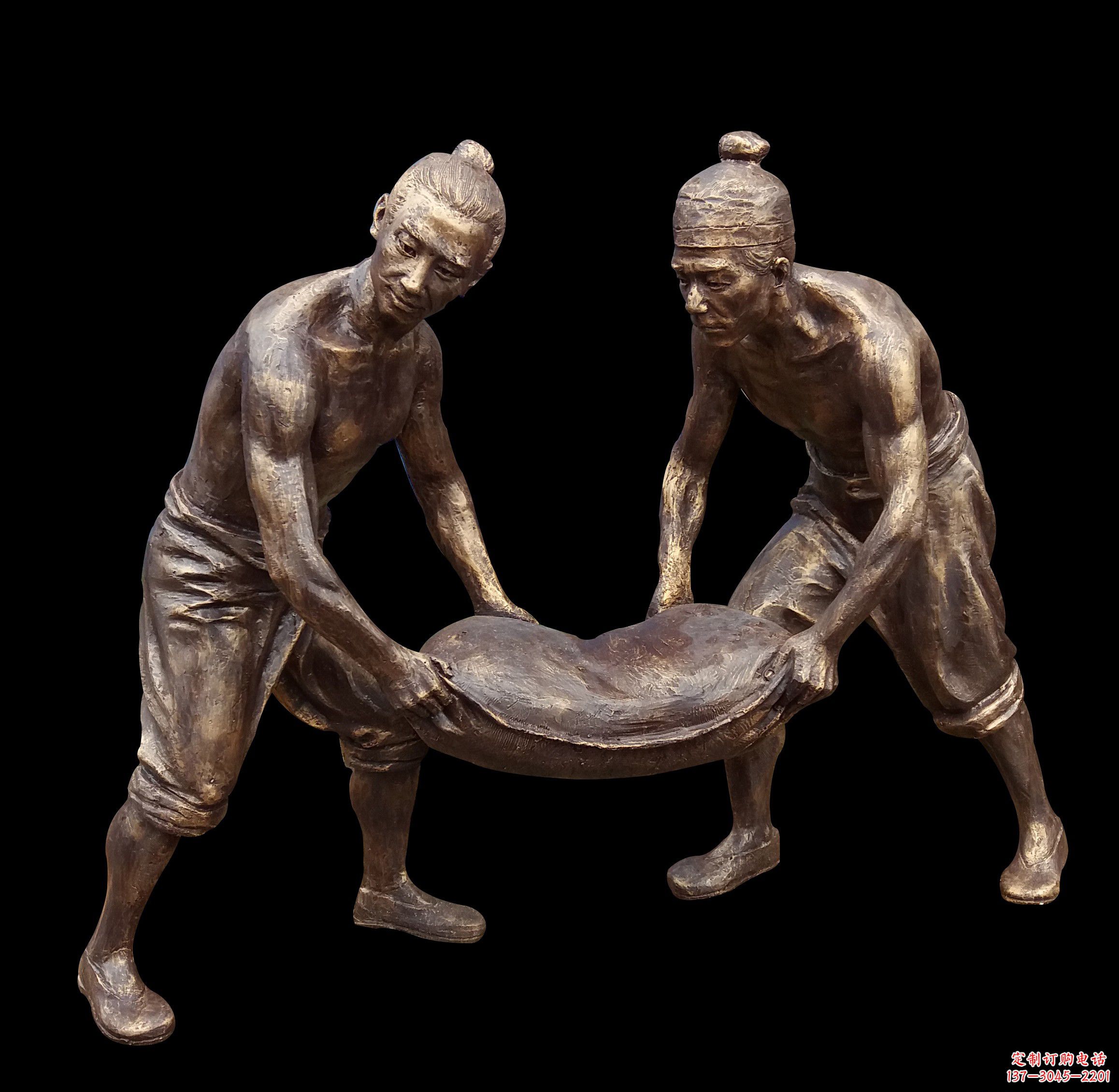 古代人物抬货物雕塑