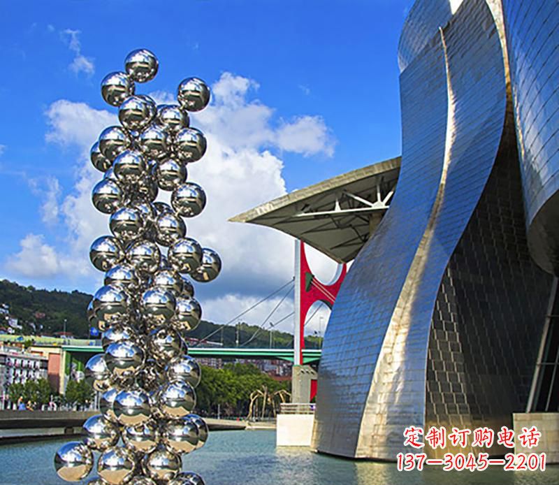 广场不锈钢抽象龙柱雕塑