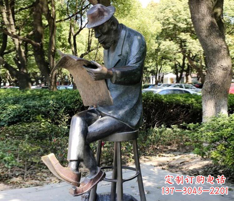 看报纸的西方人物铜雕