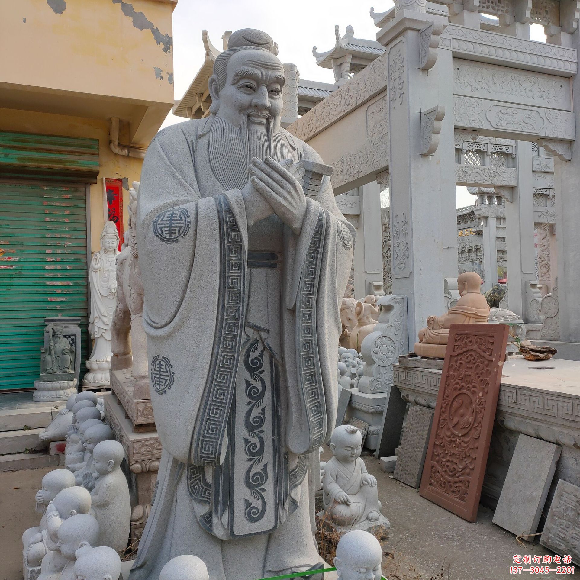 孔子问礼石雕塑像