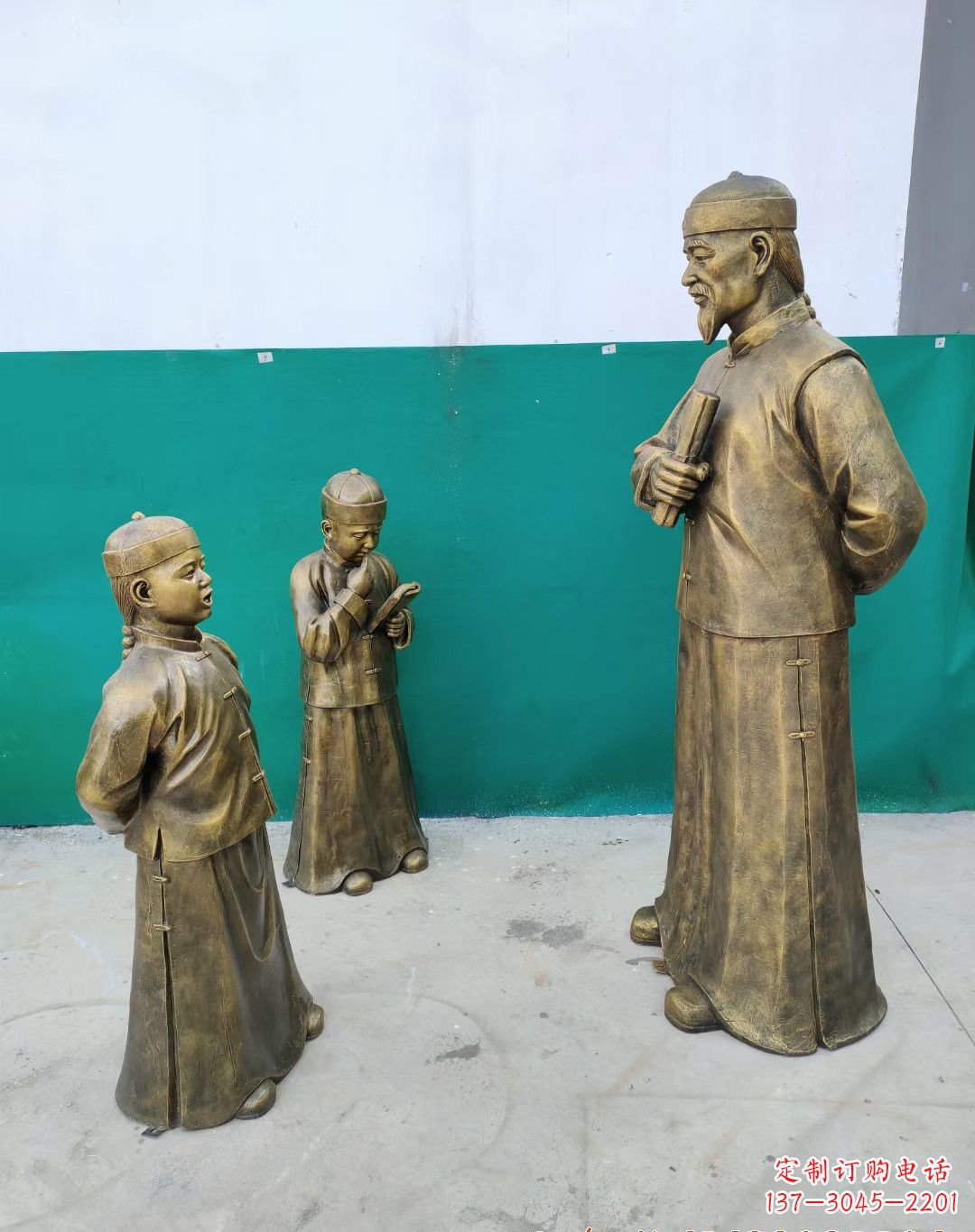 老师教导孩子铜雕