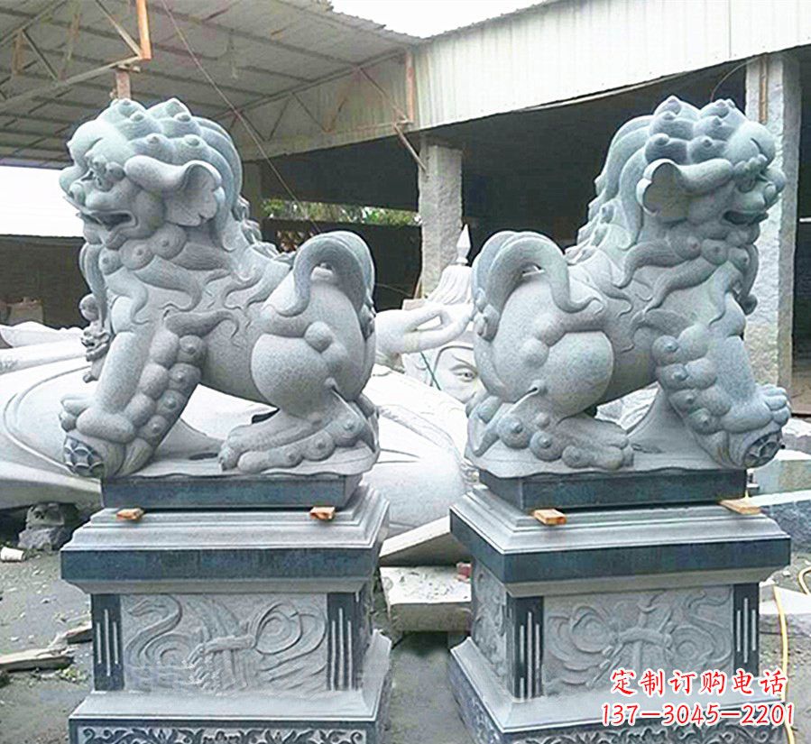 南方狮子献钱狮石雕