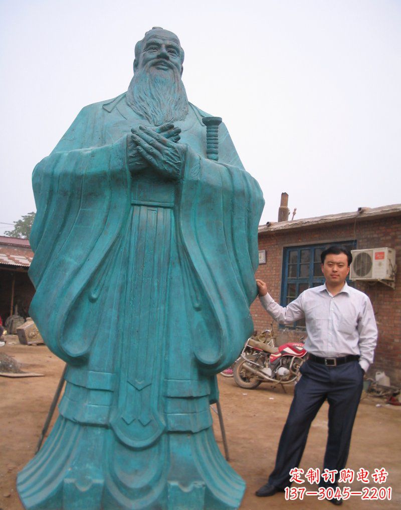 青铜孔子行教像