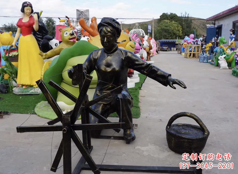 铜雕纺织人物