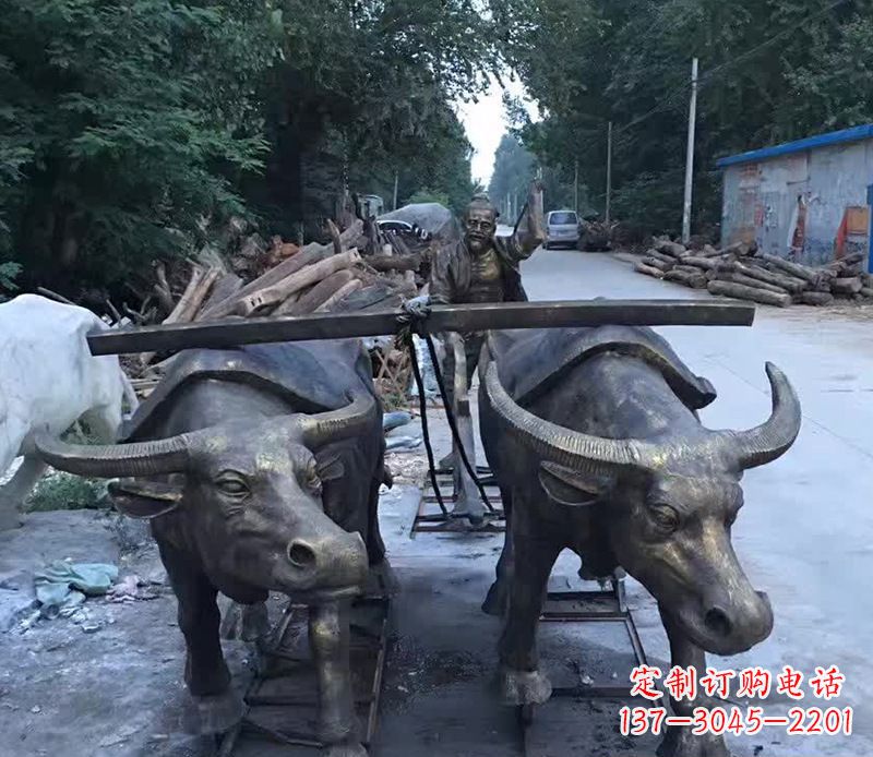 铜雕耕地牛雕塑