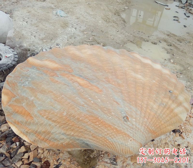 晚霞红河蚌雕塑海边景观石雕