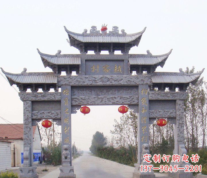 晚霞红石雕牌坊