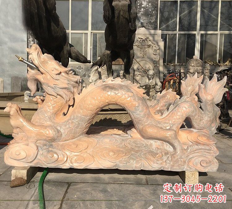 晚霞红石雕喷水龙