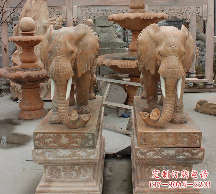 晚霞红石雕元宝大象
