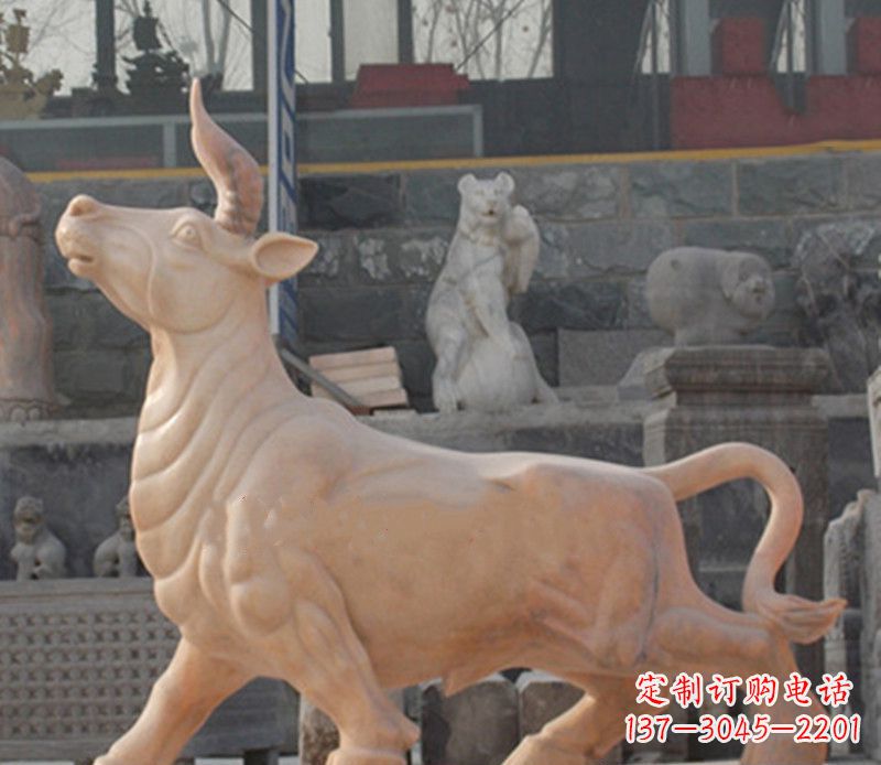 晚霞红石雕招财牛