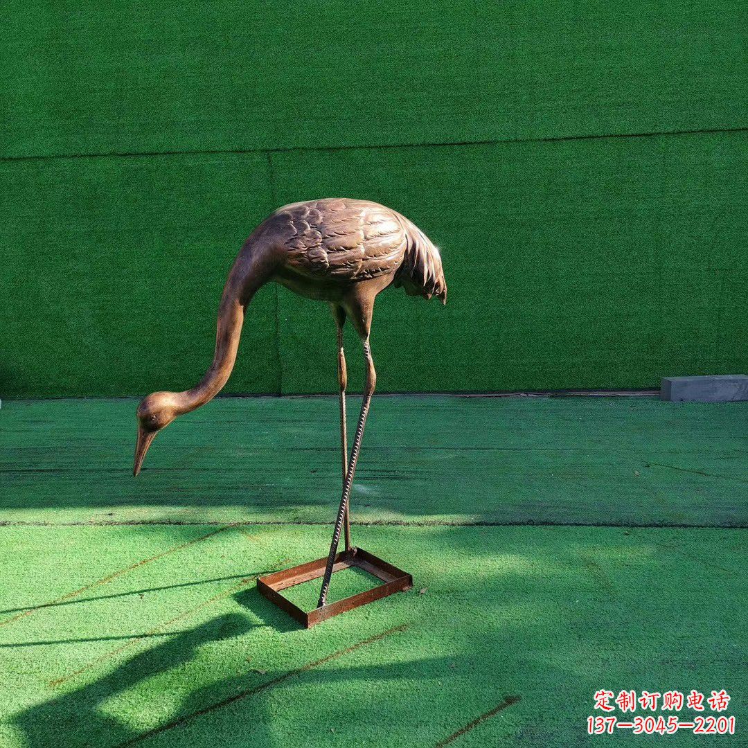 仙鹤拉鼓铜雕塑