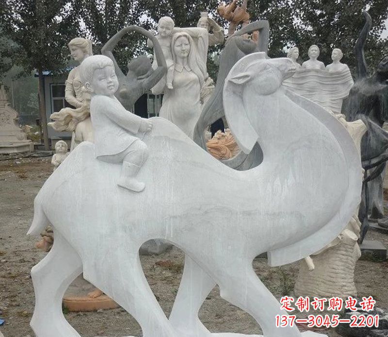 小孩骑骆驼石雕