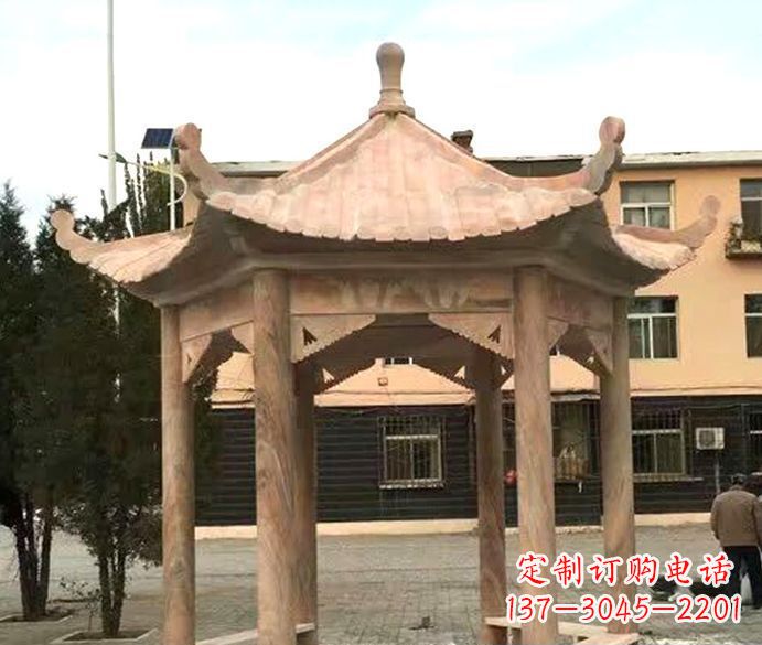 园林晚霞红六角石雕凉亭